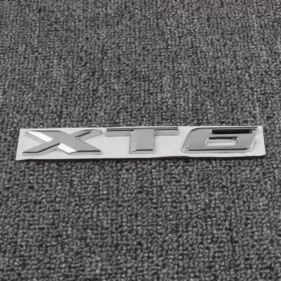 Car logo: and XT5 models; silver - standard-xt6-bright-silver