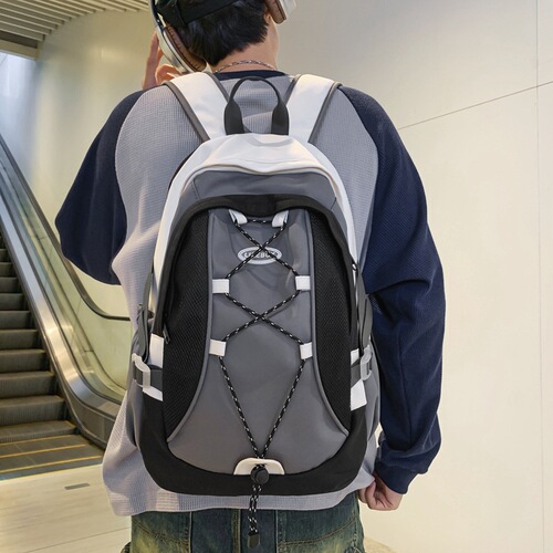 Trendy cool backpack men's color matching cross rope couple's backpack new large capacity travel backpack women's wholesale