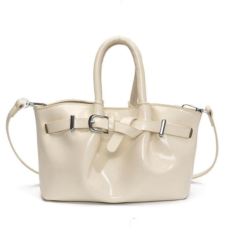 Bolsa de cubo de moda coreana 2025, nueva bolsa de hombro de moda nicho, alta sensación, bolsa de hombro de mujer.