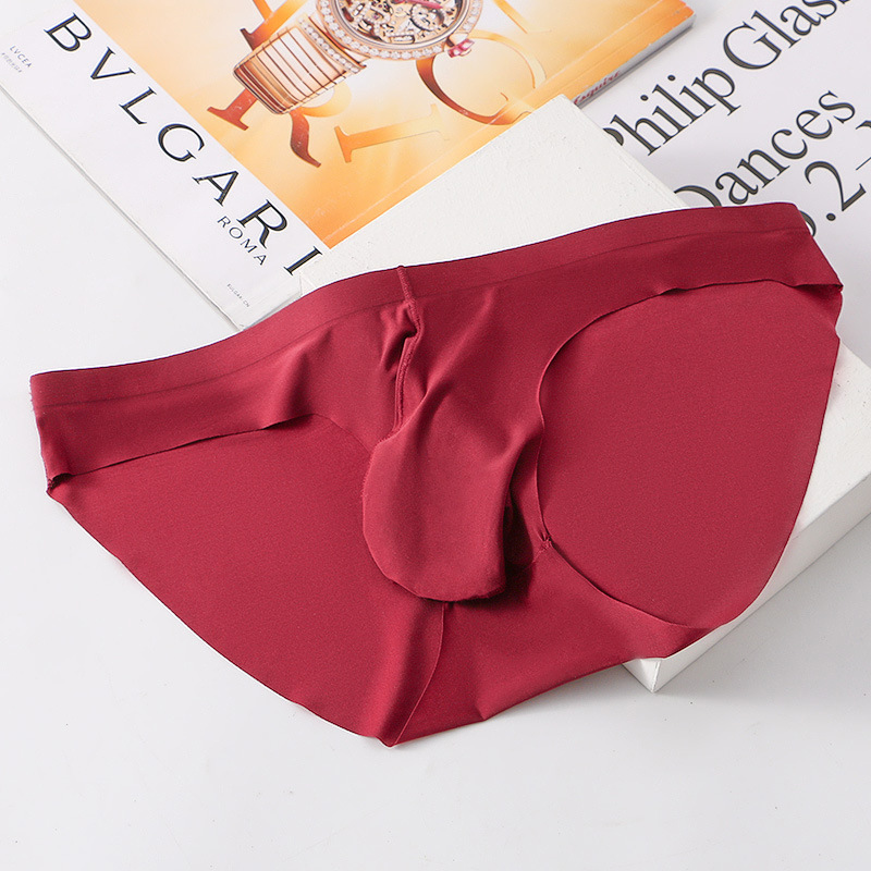 Primavera y verano nueva ropa interior sin costuras de seda de hielo calzoncillos para hombres pistola convexa separación de huevos secado rápido moda juvenil pantalones cortos de color sólido