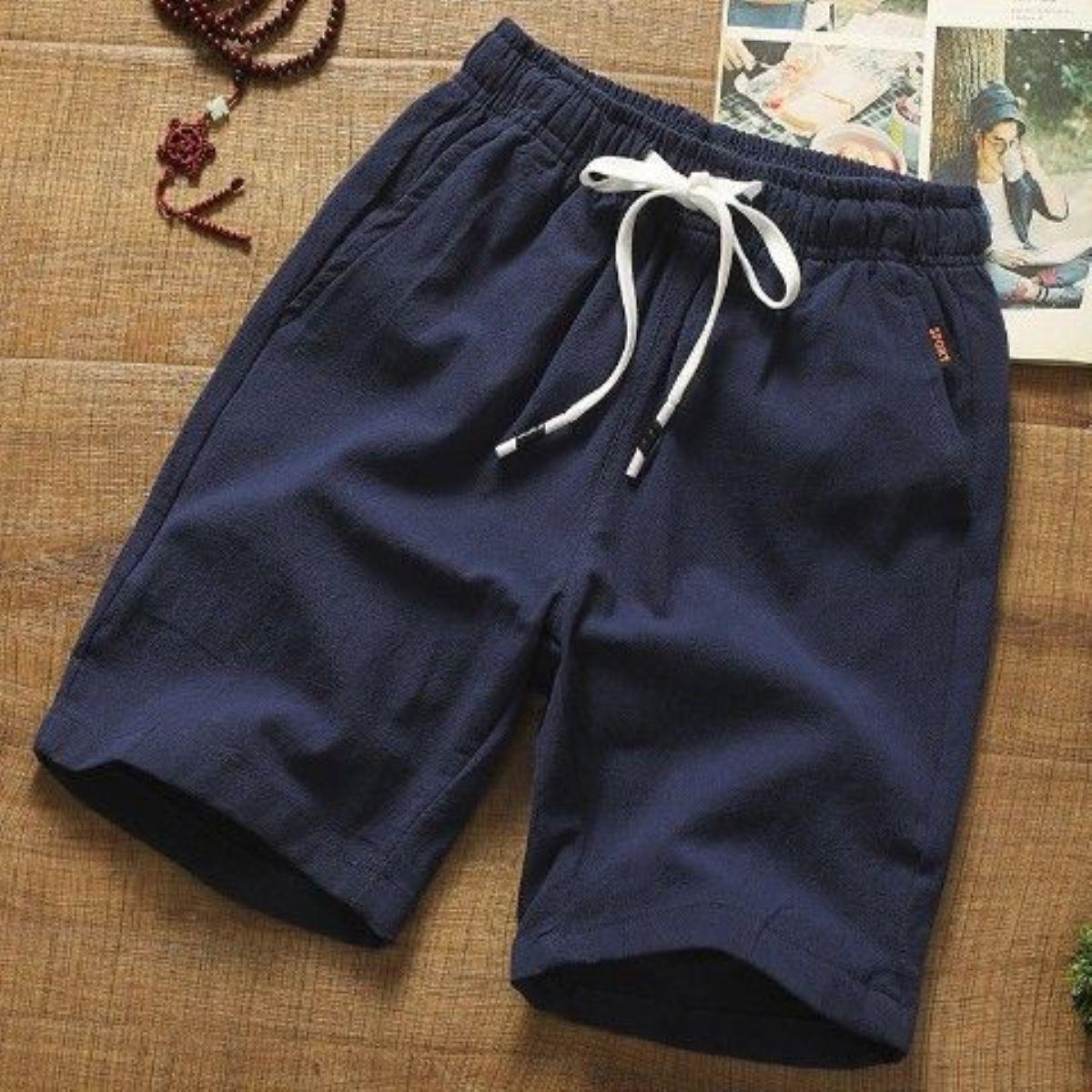Pantalones cortos casuales pantalones finos de cinco puntos de algodón y lino para hombre, pantalones sueltos de color sólido, pantalones de todo fósforo, estilo coreano, hermosos pantalones cortos de playa, marea