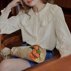 大きい襟のシャツの女性の秋の2023新型のフランスの復古の長袖のデザイン感の気質の上着