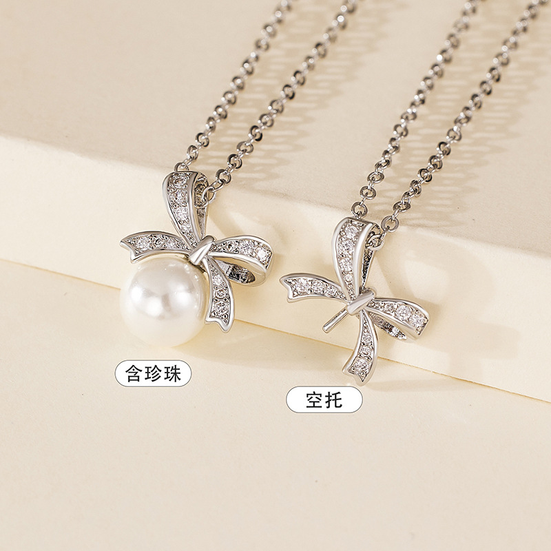 18K gold-plated necklace with a bow and pearl pendant, women's, available for wholesale, white pearls, natural pearls.