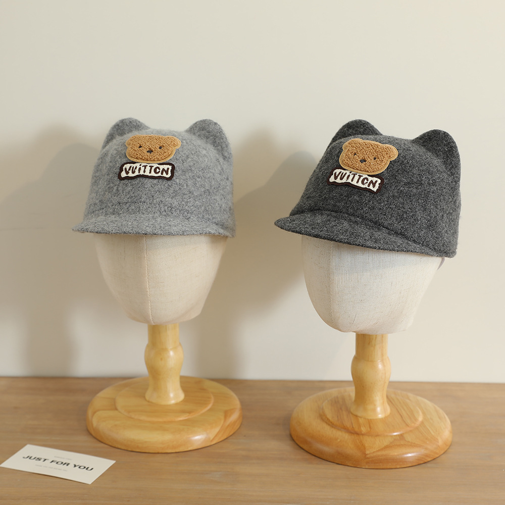La nueva gorra de orejas de oso lindo y súper lindo niño coreano bebé masculino y femenino otoño e invierno cálido sombrero de copa de lana