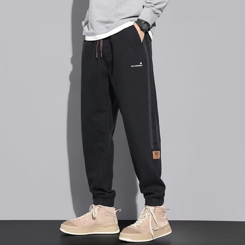 Pantalones casuales, marca de moda de otoño e invierno para hombres, pantalones bonitos, pantalones largos de Harlan de mezclilla de nuevo estilo, marea de gran tamaño para hombres