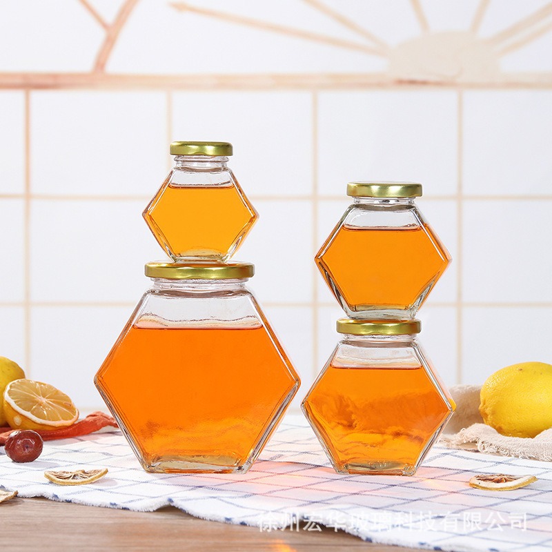 批发六角蜂蜜瓶六棱玻璃蜂蜜罐加厚宽口透明马口铁盖果酱瓶酱菜瓶
