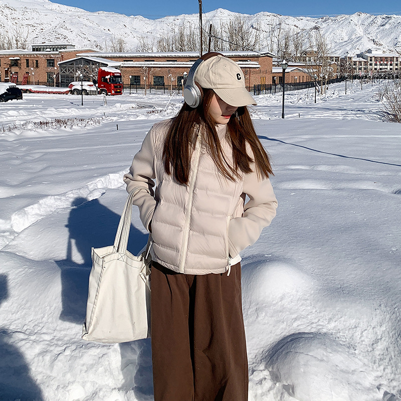 Camacos de algodón de pluma, ropa de algodón de invierno para mujeres 2025, nuevos estilos populares de este año, chaqueta de algodón pequeña, chaqueta de cuello corto