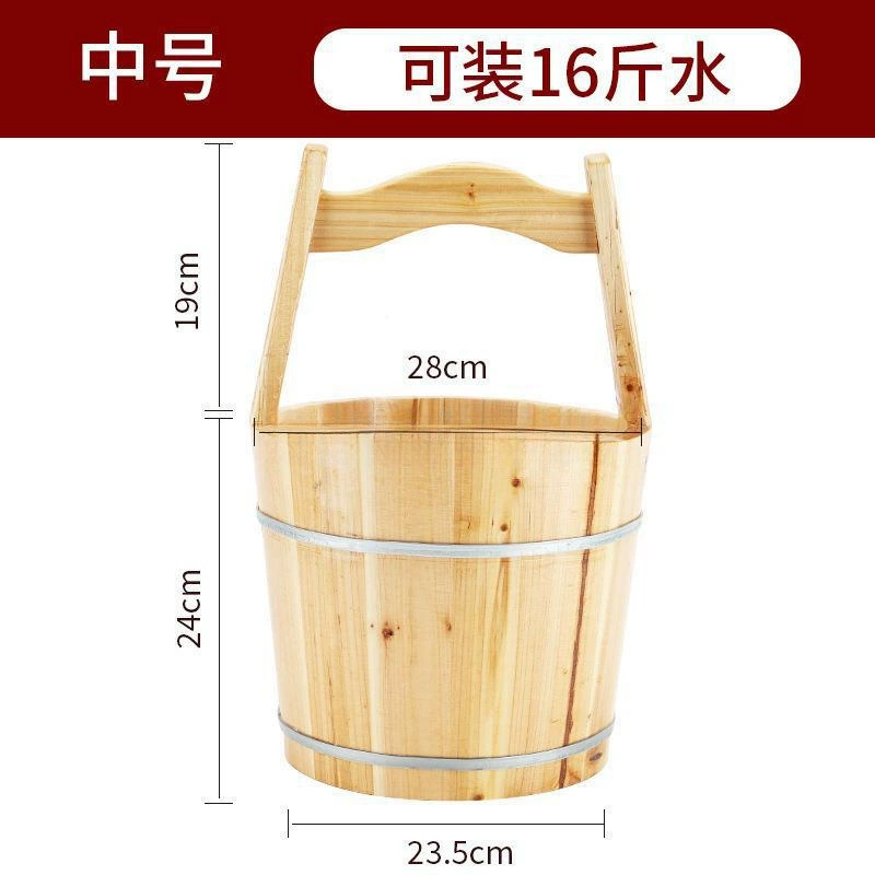 Old-fashioned wooden bucket, handheld spoon