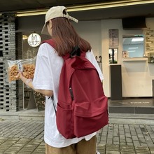 学生校园简约时尚书包纯色大容量跨境新款潮流背包百搭出行双肩包