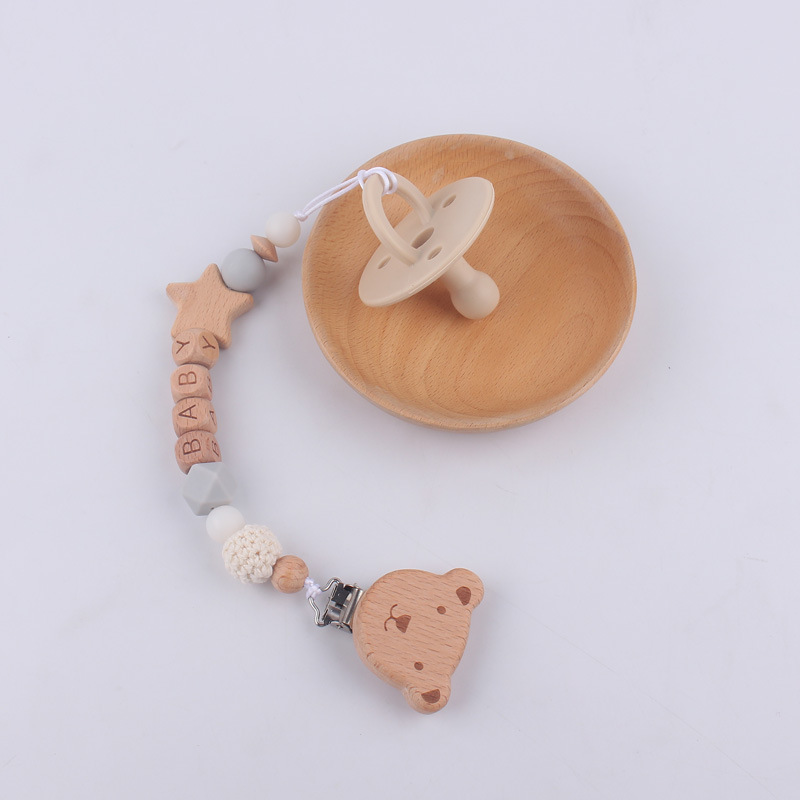 Nuevo bebé Beech dibujos animados oso chupete cadena calmante bebé chupete de silicona a prueba de mordedura cuerda de dos piezas