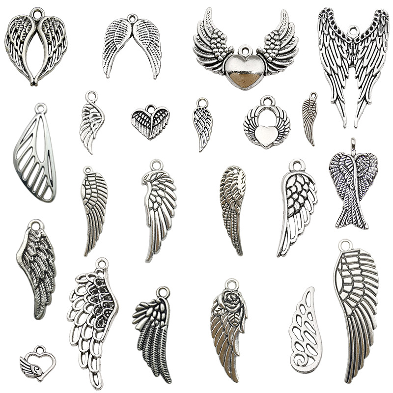 Cruzar la frontera nuevo 20 mezclado antiguo plata vintage alas de plumas de aleación de La Joyería colgante alas de Ángel colgante material