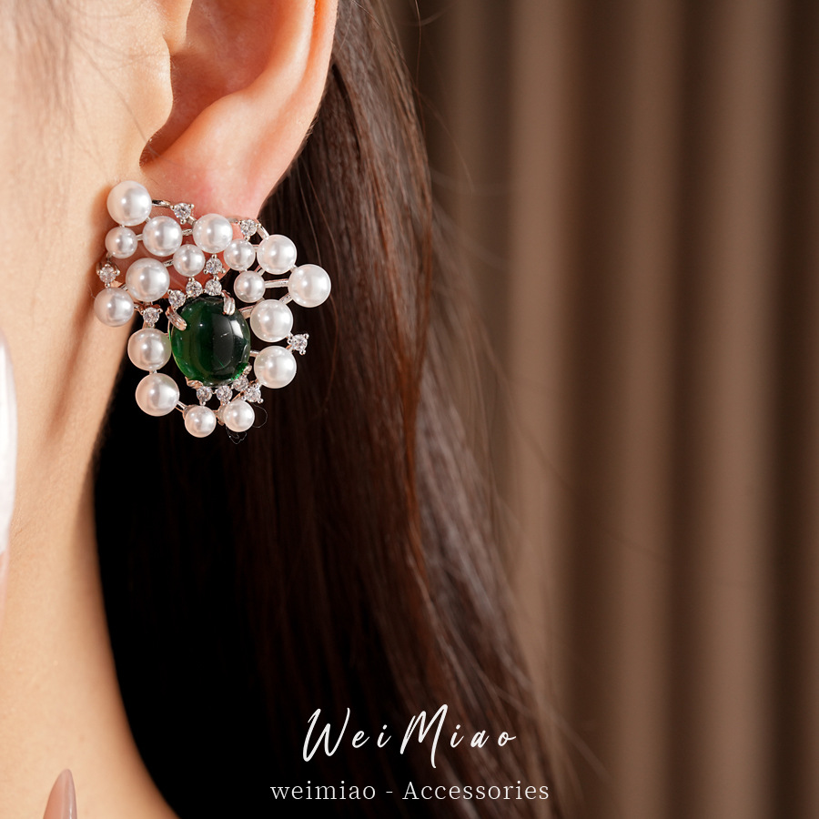 Agujas de plata de piedra de perla oval pendientes de perla estilo palacio delicado pendientes de nicho ligero lujo alta sensación auriculares al por mayor