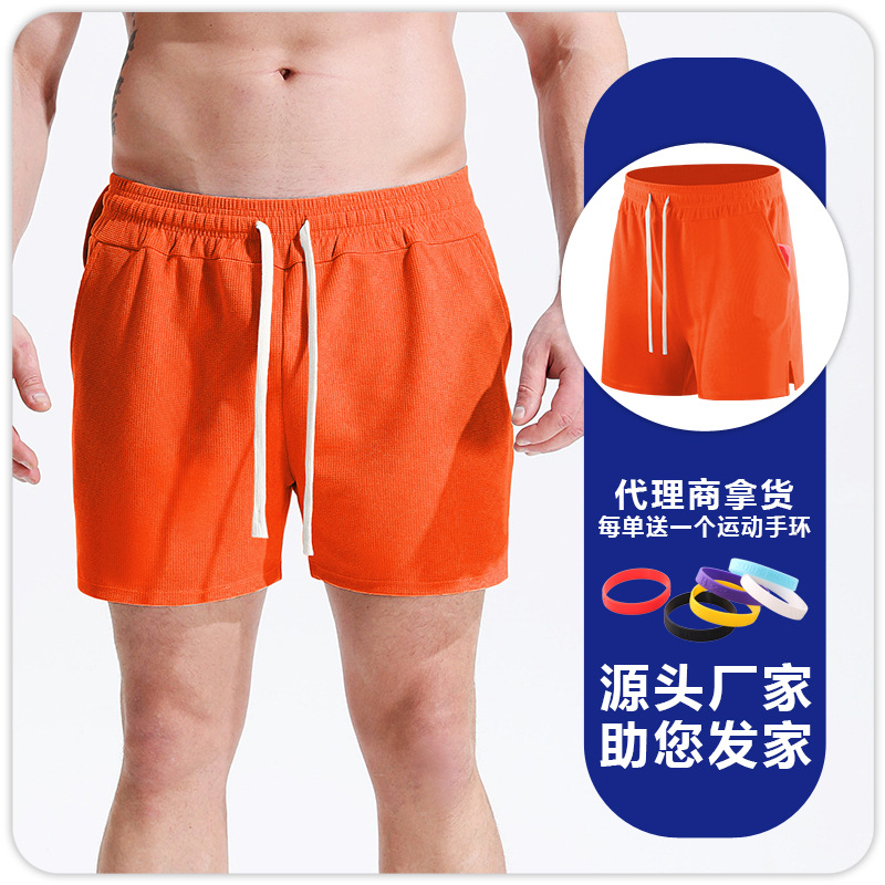 Pantalones cortos deportivos de waffle para hombres correr fútbol fitness deportes de secado rápido transpirable cómodos pantalones sueltos de cuartos delgados