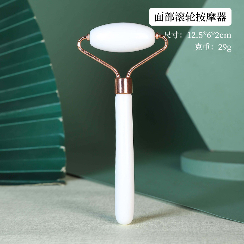 Rodillo facial de cristal en forma de corazón para masaje y lifting