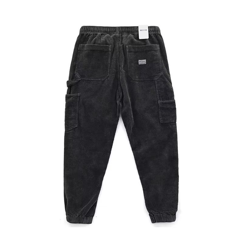 Otoño e invierno europeo y americano Nueva moda micro cintura elástica con cordón ropa de trabajo pantalones atados al tobillo pantalones casuales de pana retro para hombres