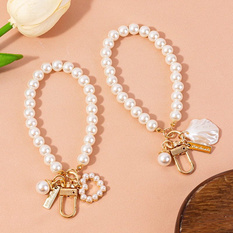 Love pearl shell car key chain bag mobile phone pearl chain pendant net red small jewelry wholesale