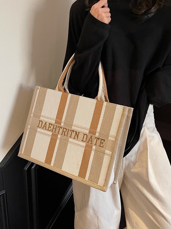 Trend Cross-border del sudeste asiático bolso portátil Tote femenino 2025 nuevo bolso de hombro casual a rayas de tela