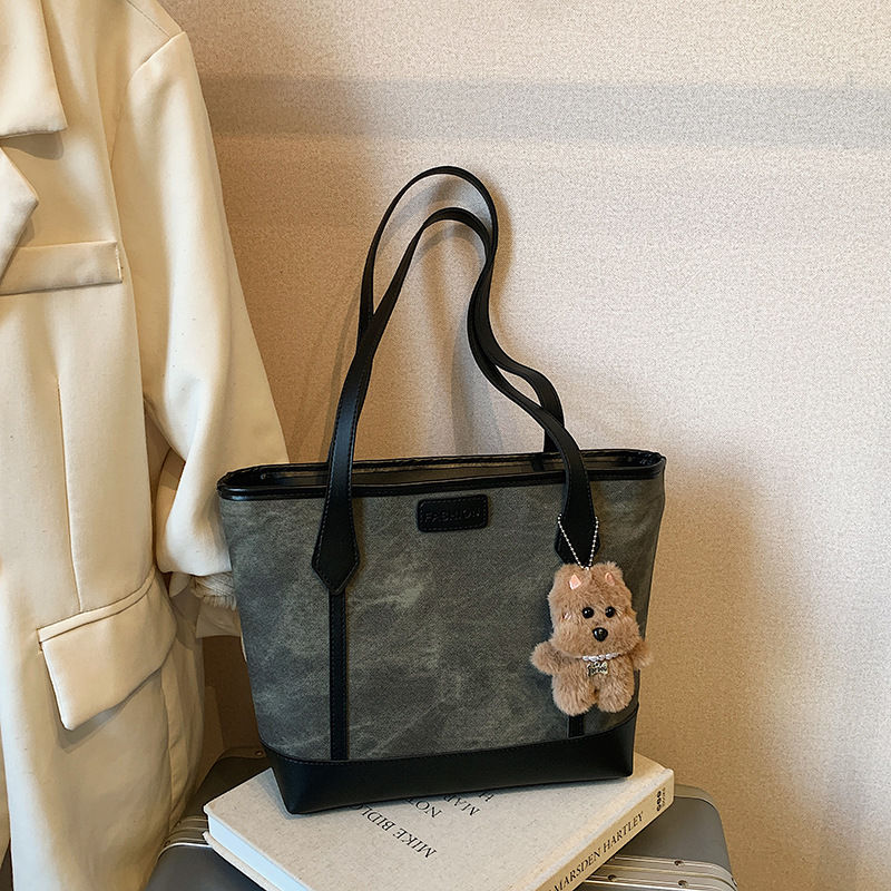 Bolsas de viaje de moda de gran capacidad de mujeres otoño 2025 nueva bolsa de hombro de estilo extranjero bolsas de mano universitarias