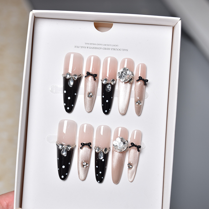 2026 otoño y invierno nuevo perro largo 4.0 manicure manicure fabricantes de productos terminados lotes negros de uñas adorables puntos de onda