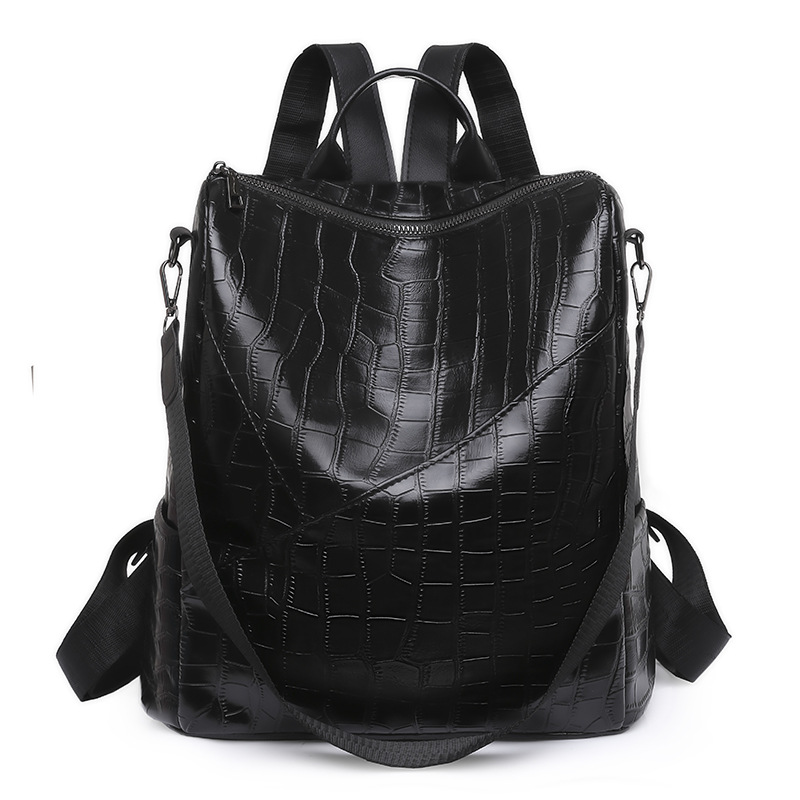 Comercio exterior 2023 verano nuevo estilo coreano PU mochila femenina moda simple de gran capacidad mochila de viaje de un solo hombro