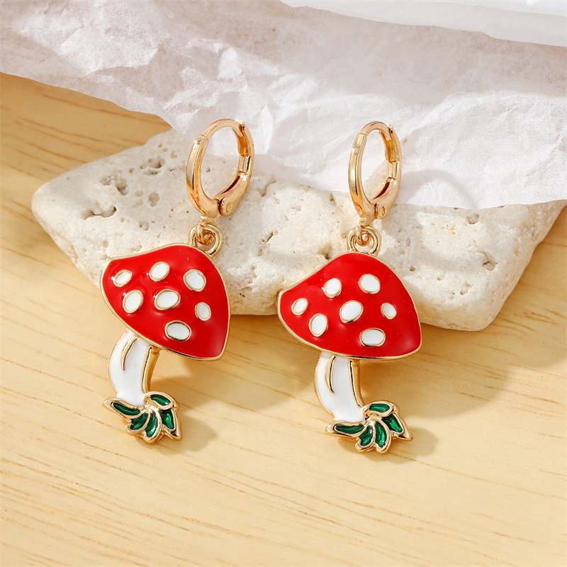 Cute Metal Dripping Oil Pearl Contrast Color Red Mushroom Earrings display picture 5