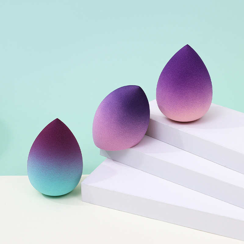 Huevo de belleza de color degradado, soplo de polvo, poliuretano transfronterizo, gotas de agua, esponja de maquillaje, maquillaje, fábrica de huevos, venta al por mayor personalizada