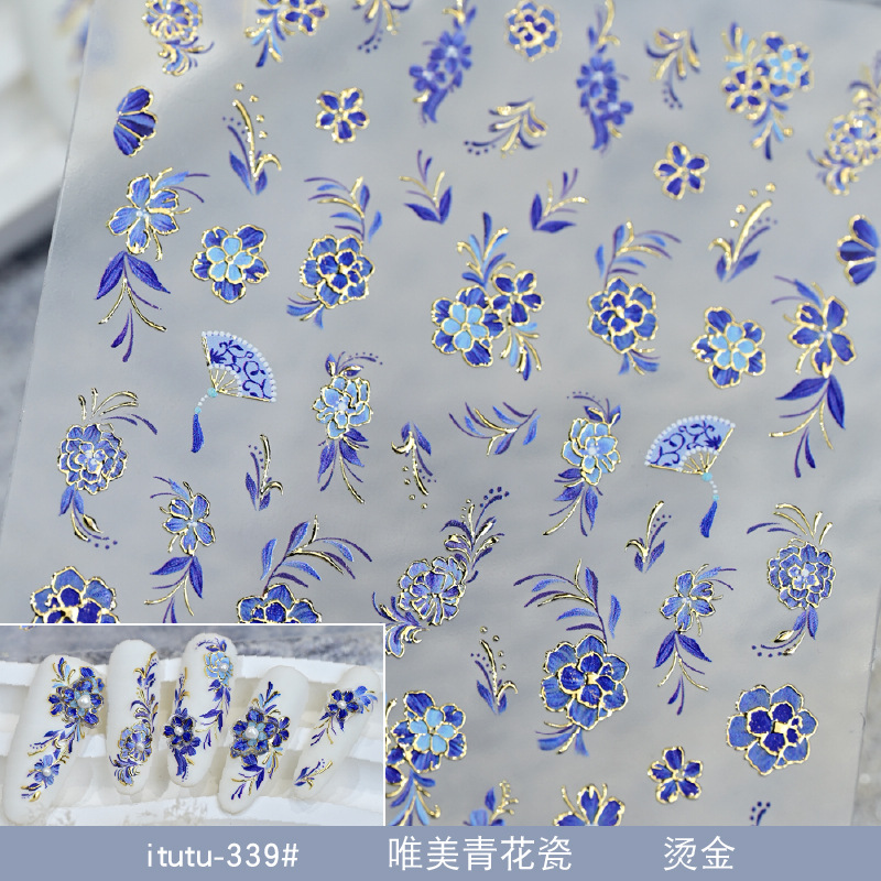 Red de celebridades de la red nuevo estilo nacional hermoso Qinghua porcelana bronceado pegatinas de uñas en caliente en relieve flores tridimensionales pegatinas de uñas plateadas en caliente al por mayor