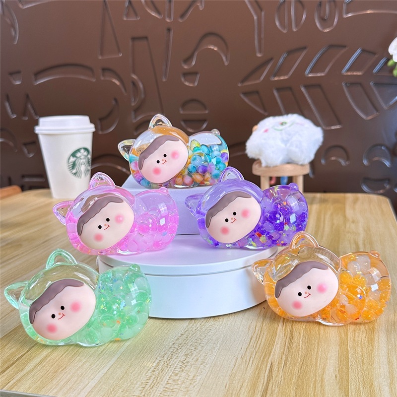 Nocturno explosivo gato macarón super lindo dibujos animados arena flotante en aceite caja ciega pequeña bolsa ciega adornos al por mayor
