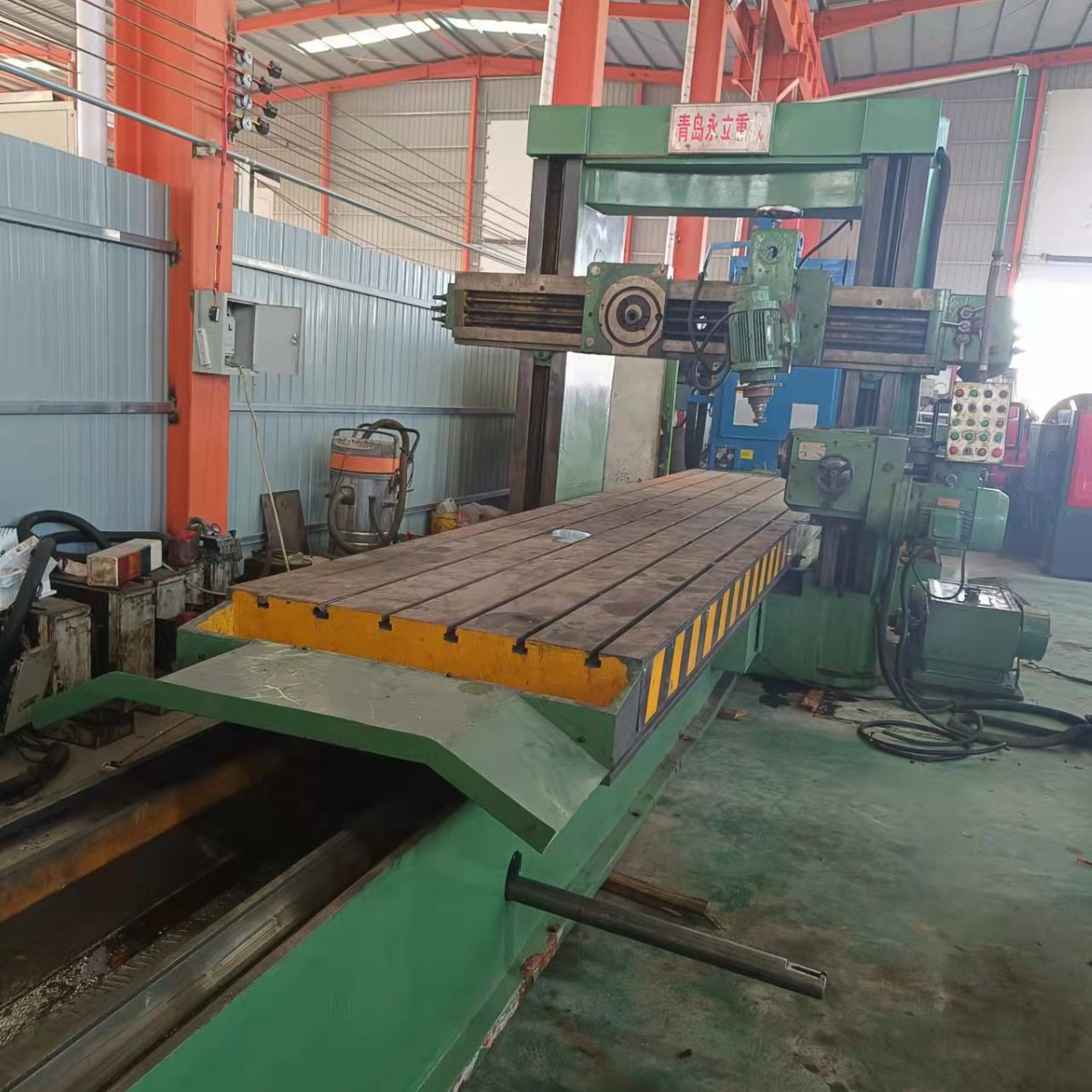 处理二手青岛永立BXMQ2013龙门刨铣磨床刨削长度:5700