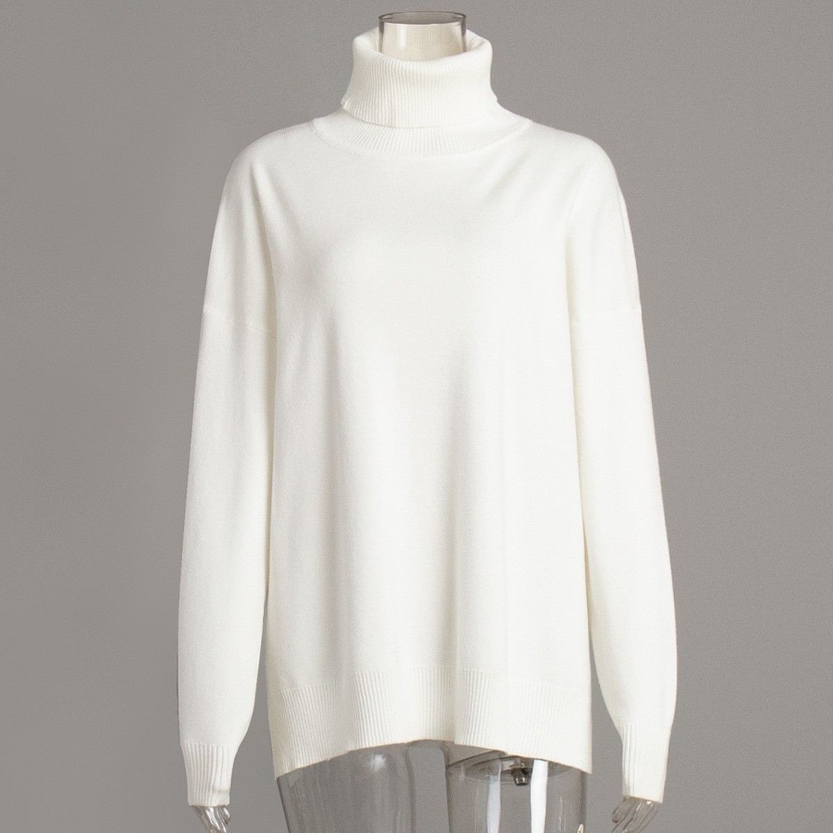 Suéter de cuello alto transfronterizo para mujeres 2025 otoño y invierno nuevo suéter casual estilo europeo y americano bifurcado suéter de punto de color sólido