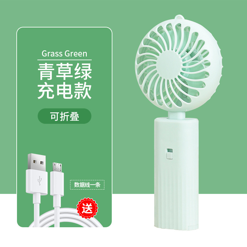 Venta al por mayor mudo gran viento plegable ventilador de mano niños portátil mini ventilador N ° 5 batería regalo LOGO