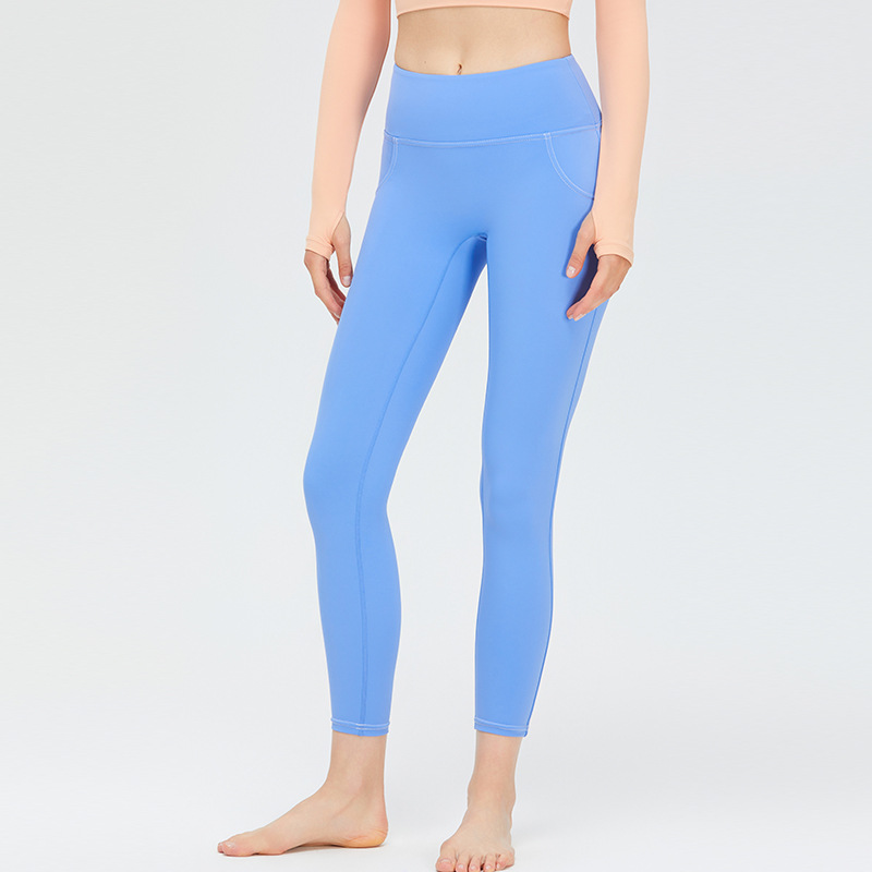 Nueva ropa de Yoga de las mujeres de Bolsillo falso elástico de la cadera melocotón pantalones de alta elástica Pantalones deportivos desnuda sensación sin T-line pantalones de yoga