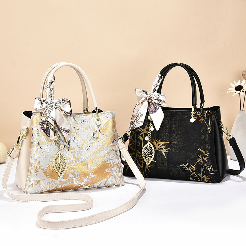 Día de la Madre 2026 nuevo estilo nacional de lujo ligero bolso de mano de estilo de mujer gran capacidad de viaje de hombro mochila