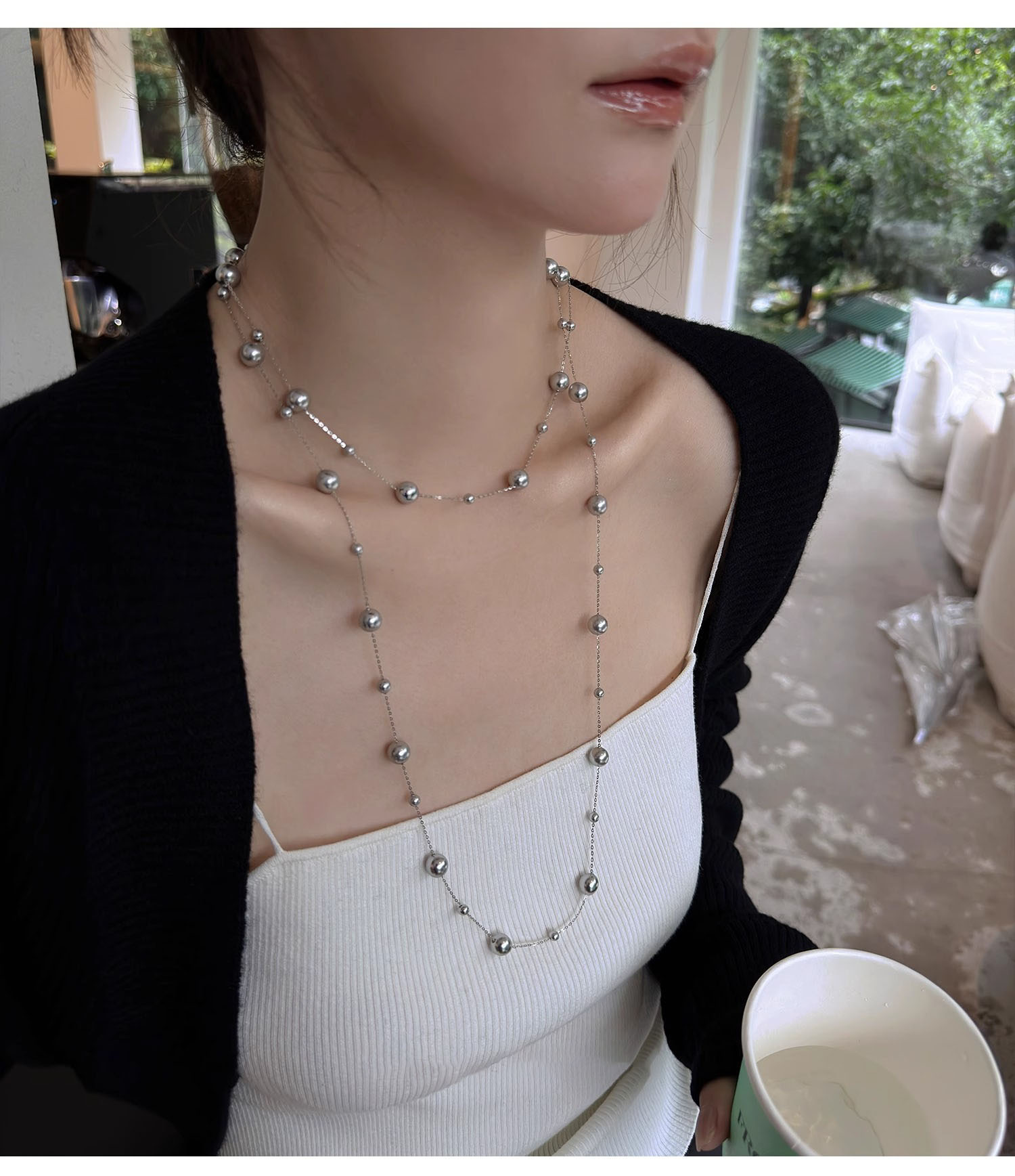 不規則な長いタイプの真珠のネックレスのフランス式の軽い豪華な気質のセーターのチェーンの小さい大衆のシンプルで高級感の項は卸売りの女性を飾ります。