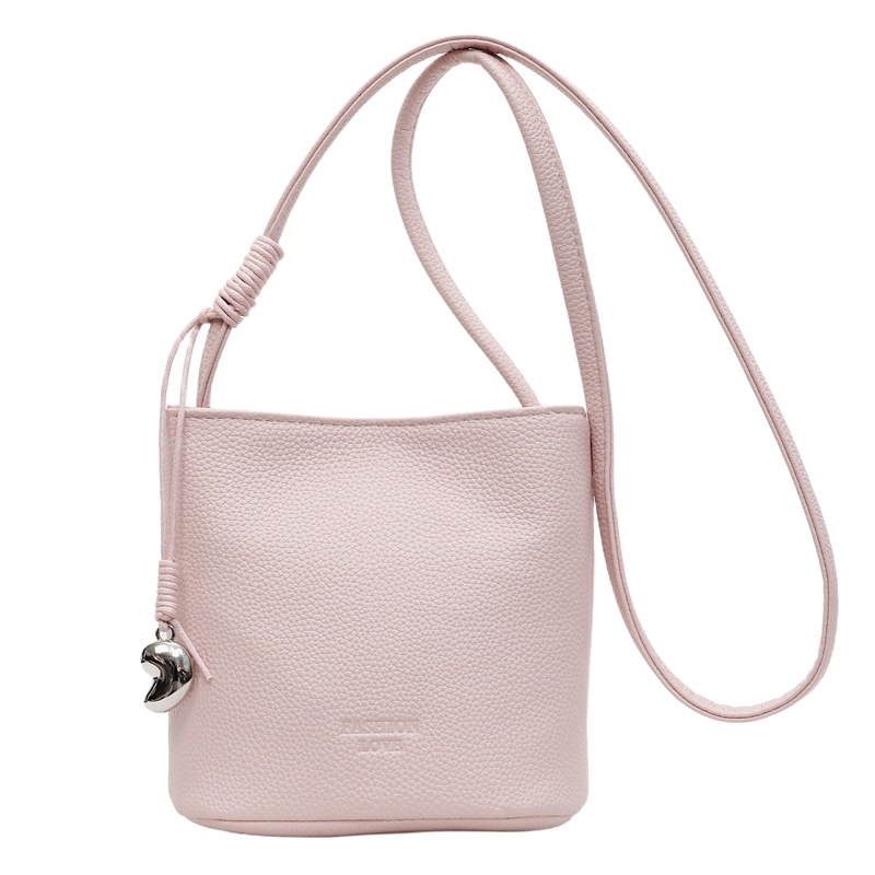 Bolsa de balde de moda de litchi para mujeres 2025 nuevo estilo de color sólido simple bolso de hombro mochila casual