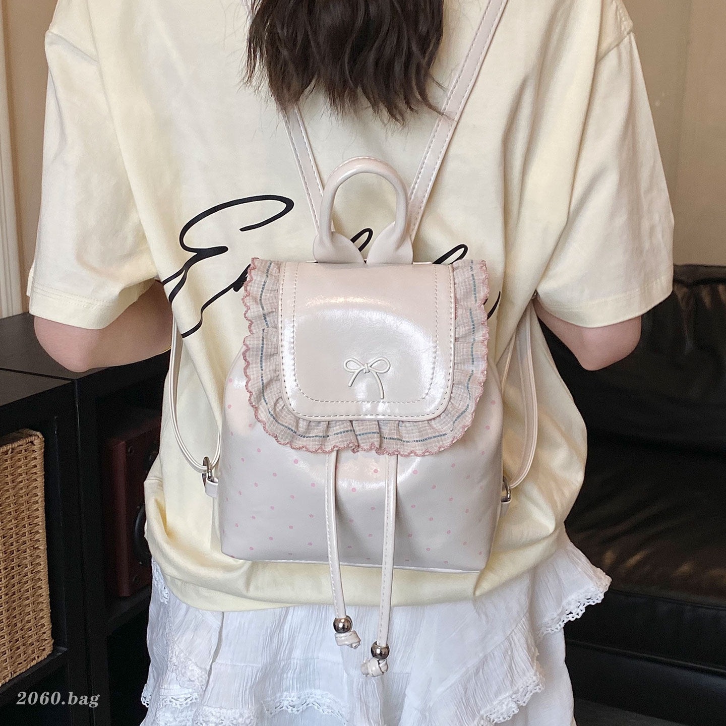 Mochila de estilo plateado de gran capacidad de viento de hoja de loto para mujeres nuevas olas de viaje de laterales de la mochila de estudiantes 2026 fiesta