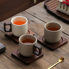 陶土の太い陶磁器のコーヒーカップの中国式の家庭用の小さくて精巧なラテのつや消しの陶磁器のコップの小さい大衆の復古の設計