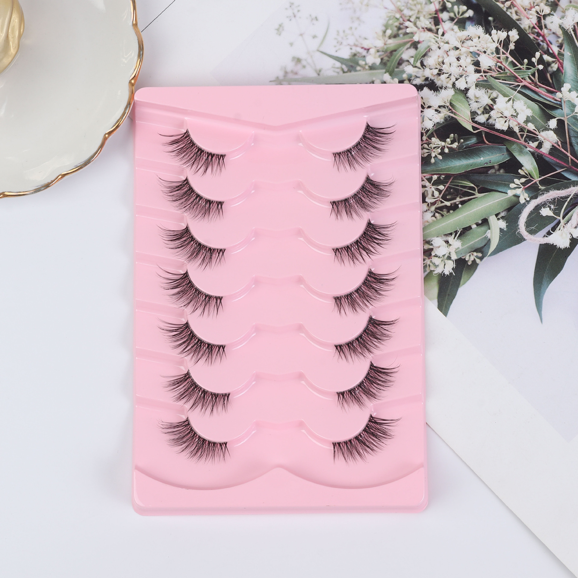 Europeo y americano nuevo estilo grueso Ojos grandes 7 pares de desordenado explosión 3D pestañas falsas pestañas repetidas al por mayor frito pelo