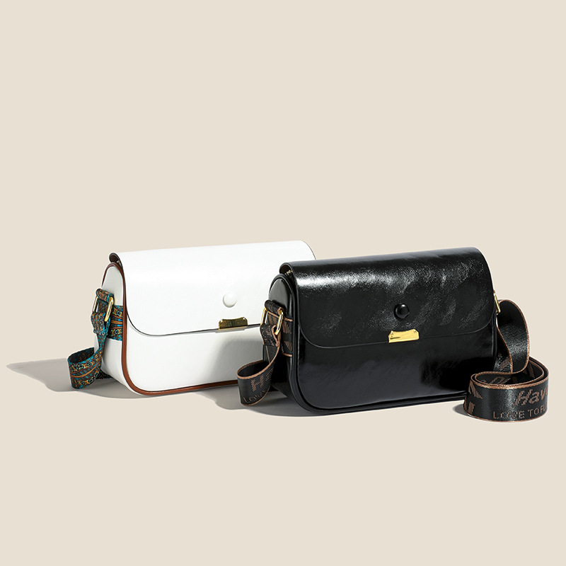 2024 moda transfronteriza color sólido sentido pu cuero suave viajes correa de hombro ancha hombro mochila pequeña bolsa de cambio ligera mano