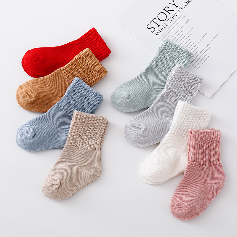 6 pairs of solid color children's socks...