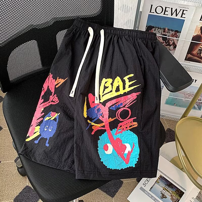 American Graffiti Casual Shorts Hombres Nuevos pantalones de verano de secado rápido de cinco puntos Pantalones de playa sueltos