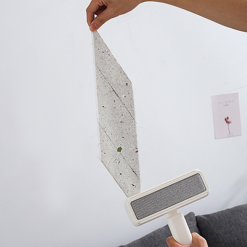 Lint roller, sticky brush, tear-off replacement rolls—perfect for picking up pet hair and fluff from clothes!