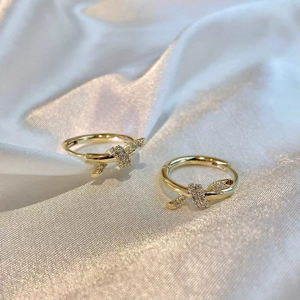 Gold-plated micro-inlaid niche design high-grade gold knotted rhinestone earrings female South Korea Internet celebrity light luxury earrings earrings earrings