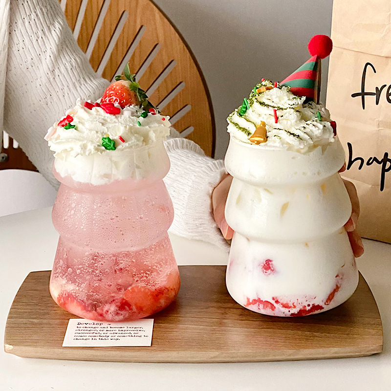 Tazas de vidrio de Navidad resistentes a altas temperaturas de jugo de frutas tazas de bebidas frías tazas de café tazas de diseño de alto valor visual nicho