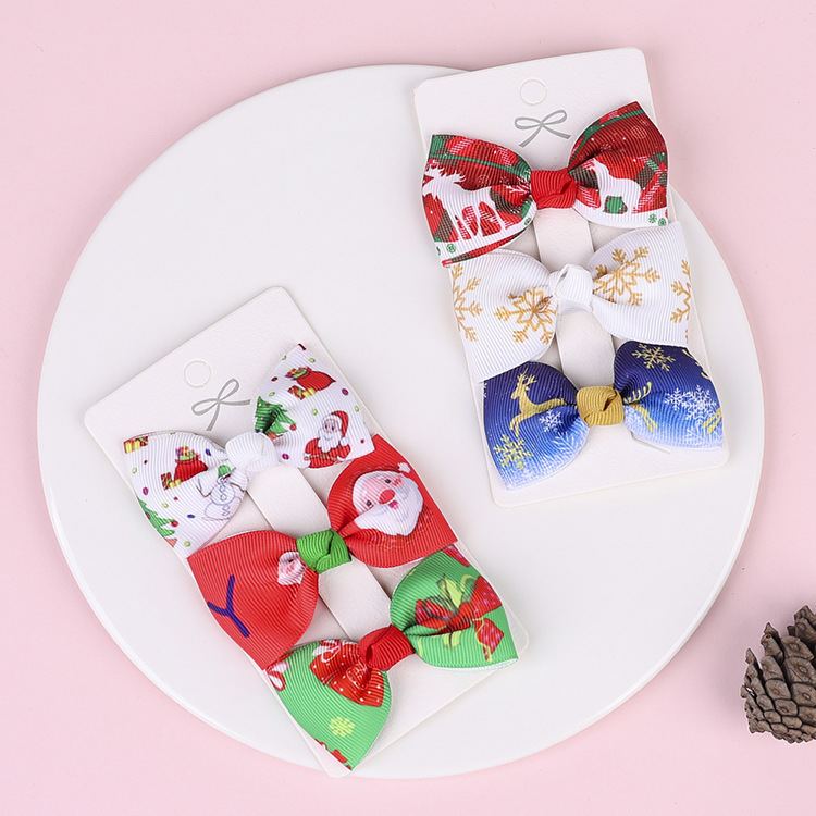 Christmas Printed Bow Children's Hairpins 3 Sets Wholesale Nihaojewelry display picture 1