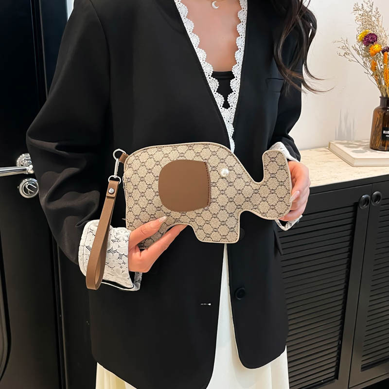 Elefante embrague mujer dibujos animados moda cena nuevo estilo retro personalidad verano exquisito 2025 bolso de mano