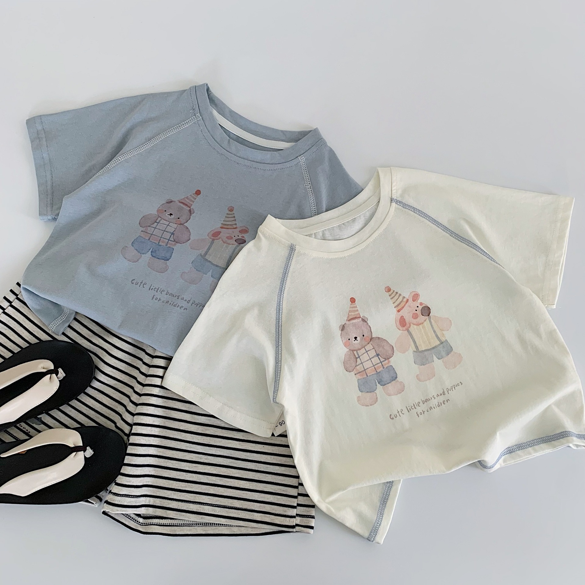 Maibao niños verano manga corta 2025 nuevos niños y niñas dibujos animados oso camiseta salvaje Huzhou Zhili ropa para niños clase a