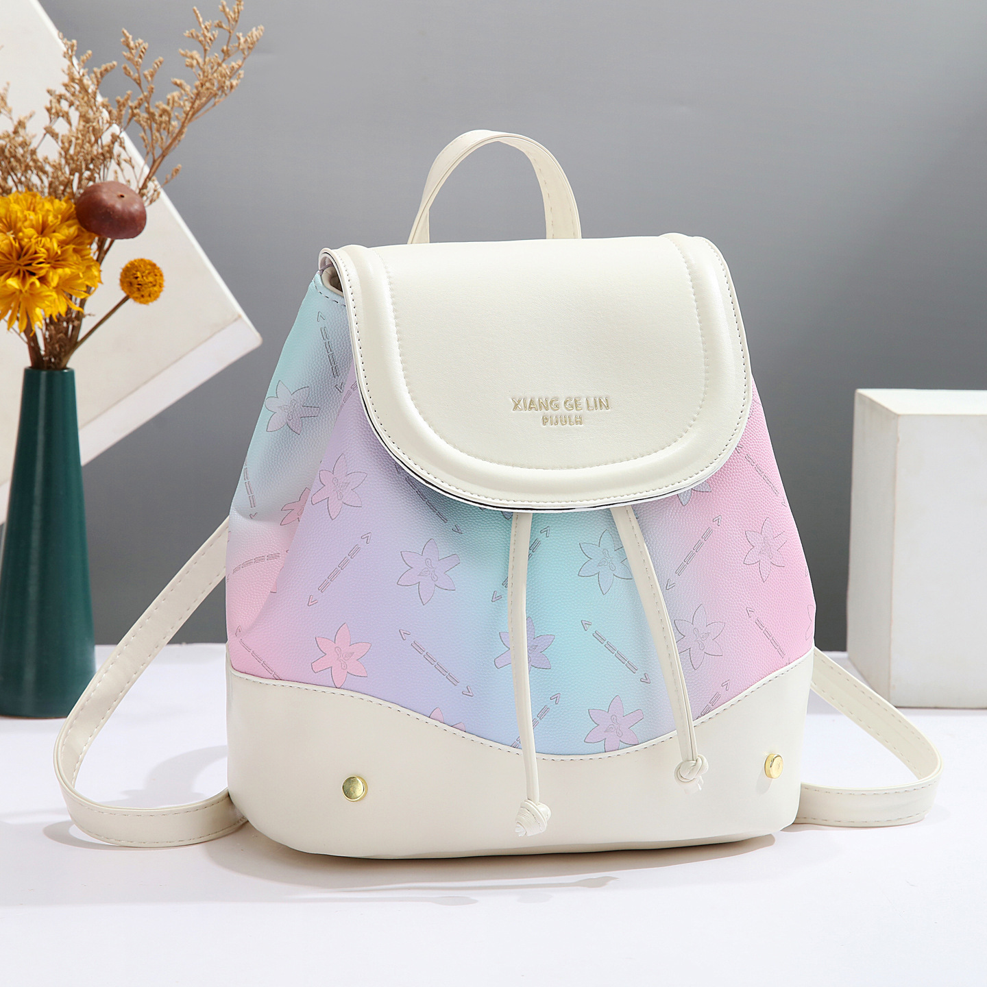 2025 nueva mochila de estilo universitario de moda de moda de impresión de moda de mujeres mochila de verano simple versátil mochila de estudiantes