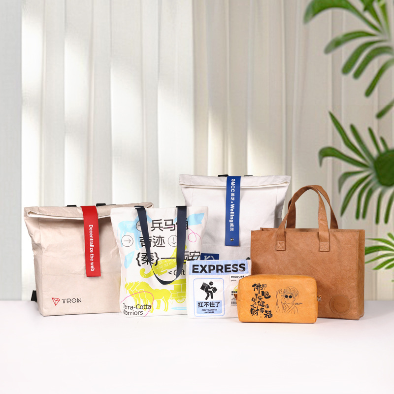 Bolsas de papel DuPont retro personalizadas para salir bolsa de compras kraft impermeable impresión LOGO de hombro único bolsas de papel DuPont
