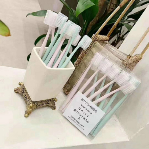 The same type of nano-unprinted Japanese-style macaron bamboo charcoal toothbrush for adults and children with large and small heads, filament and soft bristles